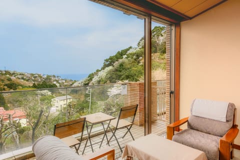 Comfort Room, Multiple Beds, Terrace, Mountain View | In-room safe, blackout drapes, WiFi (free), individually decorated