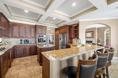 Whip up your favorite meals in this fully stocked kitchen with a large island and high seating—perfect for casual dining and conversation