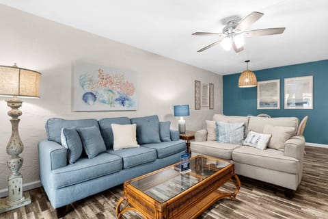 This tastefully updated living space is open to the dining area