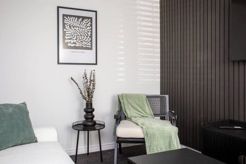 The seating area offers a welcoming and comfortable spot for visitors to relax while they wait.