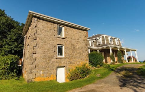 The Maid Quarters is a grand stone structure behind the main house. 