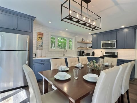 Open-concept kitchen and dining space.