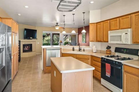 The kitchen is fully-fitted