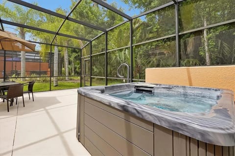 Enjoy your private hot tub and lanai