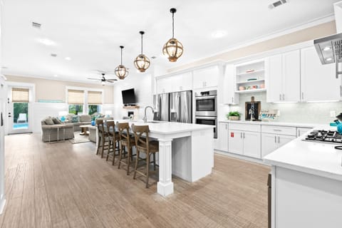 Expansive kitchen is well supplied for cooking