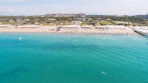 Private beach nearby, free beach shuttle, beach towels, beach bar