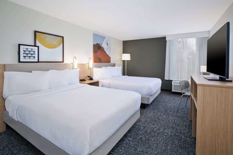 Room, 2 Queen Beds | In-room safe, iron/ironing board, free WiFi, bed sheets