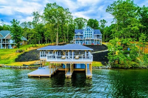 Stunning lakefront property with a spacious boathouse and beautiful views, perfect for a relaxing getaway