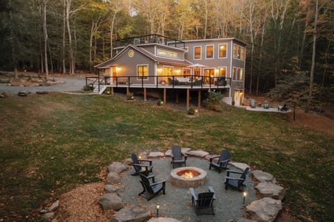 Brand new hardscape, fire pit, and lower stone patio (now with a cedar hot tub).