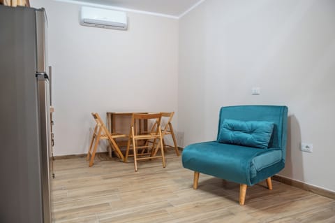 Apartment, 1 Bedroom, Kitchen | Living area | Flat-screen TV