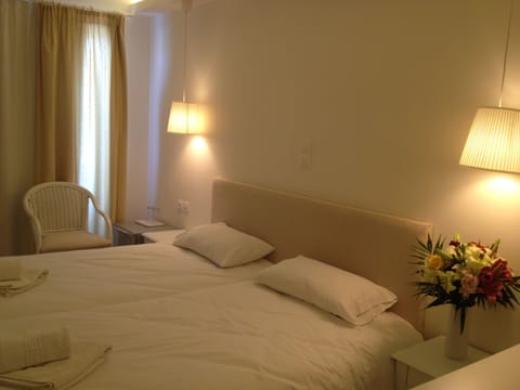 Double or Twin Room, Sea View | Minibar, in-room safe, desk, laptop workspace