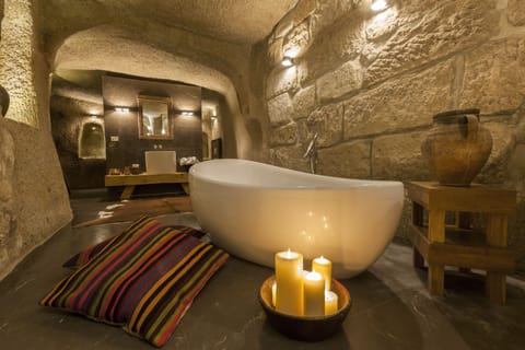 Chapelle King Suite | Bathroom | Deep soaking tub, hair dryer, bathrobes, slippers