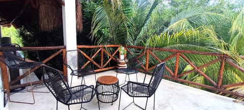 Private terrace equipped with chairs for relaxation