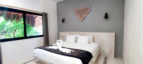 Bedroom: equipped with a closet, king-sized bed