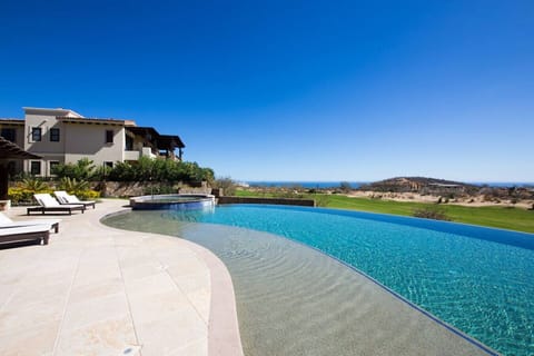 Take a refreshing dip in the infinity-edge pool while enjoying panoramic views.