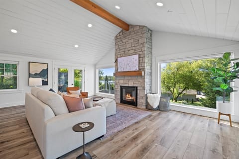 Panoramic views of Pewaukee Lake from this luxury lakeview home.