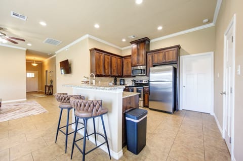 Kitchen with bar seating for 2