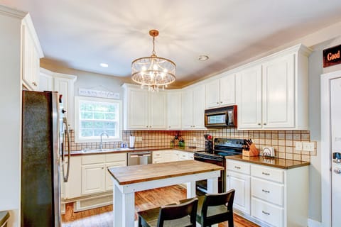 Kitchen located on main level upon entry of the home