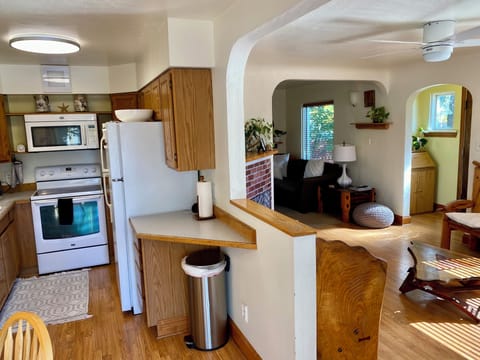 Upstairs kitchen into living room area.
