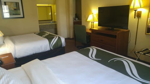 Premium bedding, pillowtop beds, blackout drapes, iron/ironing board