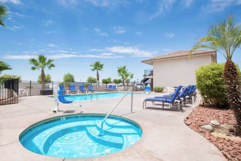 Outdoor pool, open 8:00 AM to 11:00 PM, sun loungers