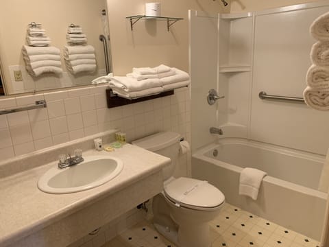 Double Room, 2 Queen Beds | Bathroom | Combined shower/tub, free toiletries, hair dryer, towels