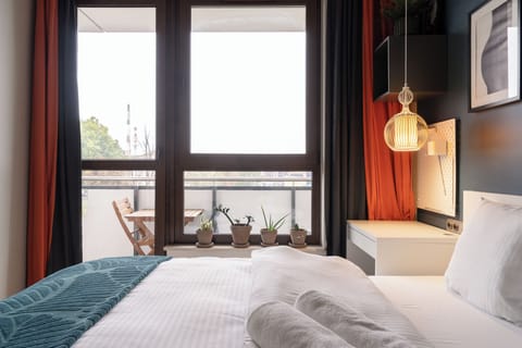 Apartment, Balcony, River View | 1 bedroom, iron/ironing board, free WiFi