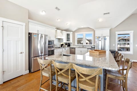 The fully equipped Kitchen has everything you need to prepare meals your family will love with two refrigerators, two dishwashers, two ovens, and a large breakfast bar with seating for six.