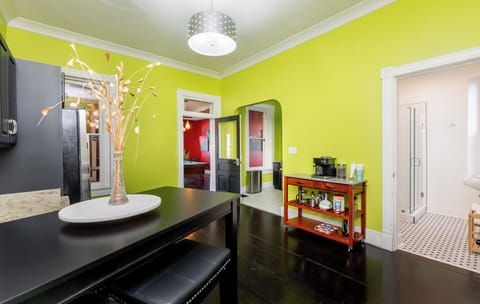 Enjoy your morning coffee in the bold and colorful dining area.