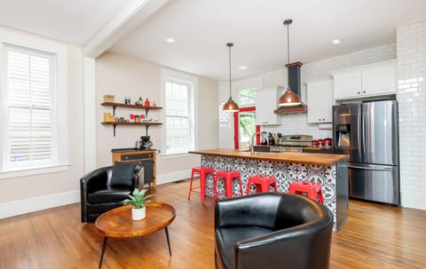 Bright open kitchen with butcher block island