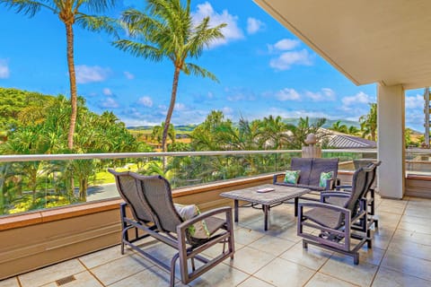 Unwind on the spacious lanai at Honua Kai Konea 232 with cozy seating and scenic island views.