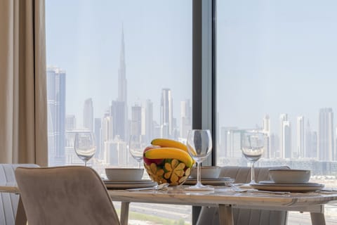 Deluxe Apartment, Balcony, City View | Dining room