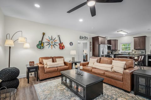 Spacious living room with musical theme!