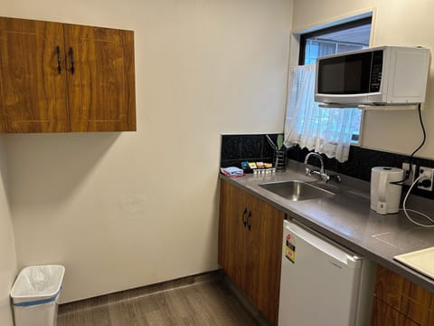 Comfort Studio | Private kitchen | Full-size fridge, microwave, stovetop, cookware/dishes/utensils