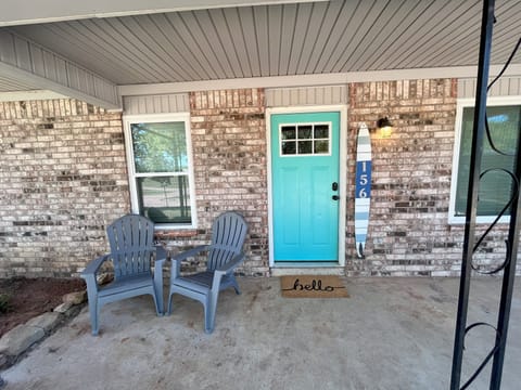 Look for the blue front door and water ski with house number to find our home.