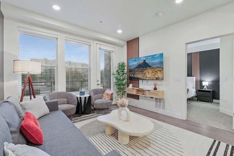 Relax in style – our living room features cozy sofas, a chic center table, and large windows for natural light.