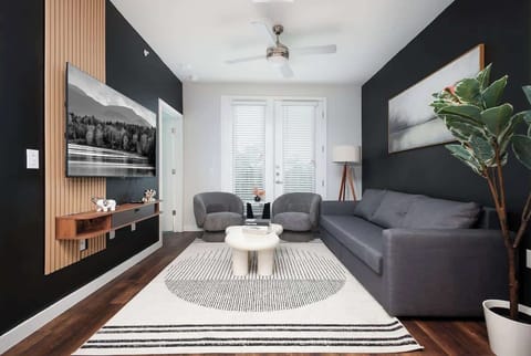 Gather in our inviting living room, where a comfy sofa and unique decor create a stylish and comfortable space.