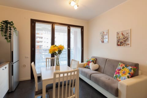 Comfort Apartment | Living area | 50-inch Smart TV with digital channels