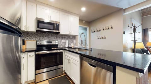 Full kitchen with stainless-steel appliances