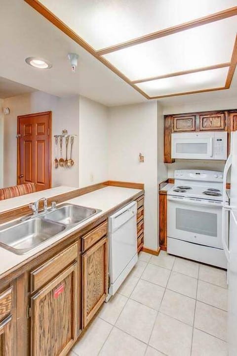 Kitchen w/ toaster, drip coffee maker, slow cooker, pots/pans and more