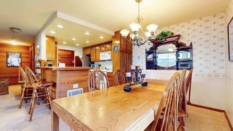 The dining room table offers seating for 6