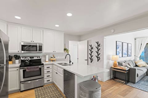 Kitchen with drip coffee pot, slow cooker, blender, toaster, and more