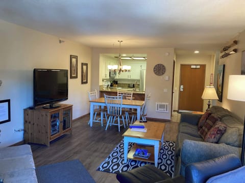 Newly updated living room with fireplace and TV