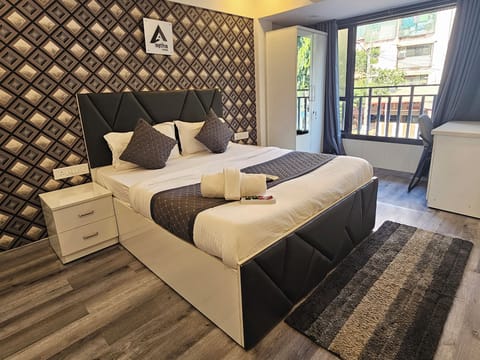 Deluxe Double Room, City View | Desk, laptop workspace, iron/ironing board, free WiFi