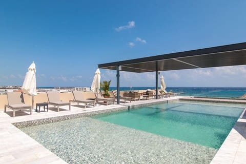 Work on your tan or cool off in the sparkling pool