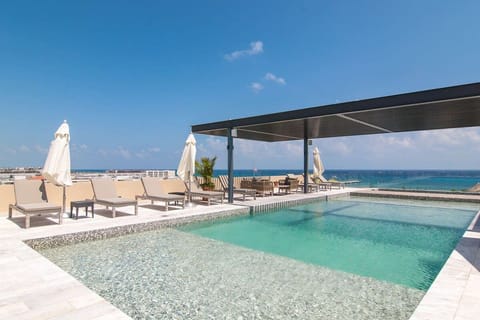 Work on your tan or cool off in the sparkling pool