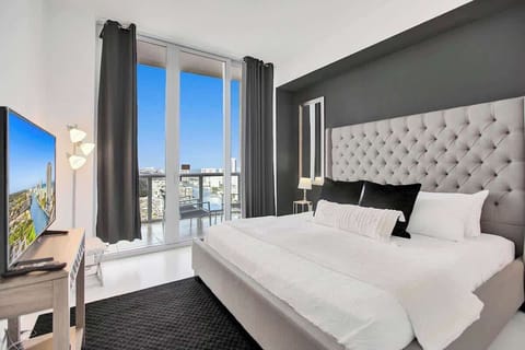 Unwind in Bedroom 1, complete with a luxurious king-size bed and a TV for your personal enjoyment.