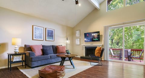 Open living room with sleeper sofa and smart tv