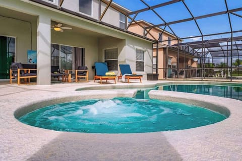 Relax in your private oasis with a sparkling pool and soothing spa! Unwind on comfortable loungers, enjoy the Florida sunshine, and make lasting memories in this inviting outdoor retreat.