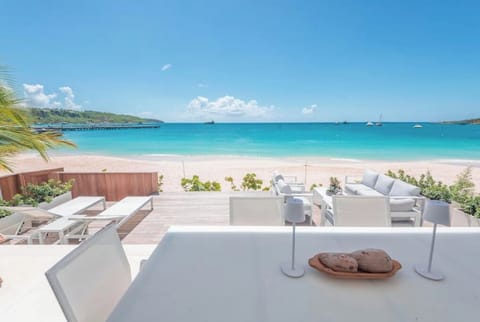 View from terrace dining room table overlooking your private wood deck on beach.